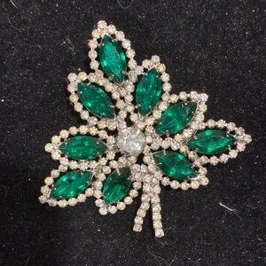 Vintage mid century green rhinestone brooch